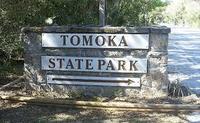 tomoka park logo